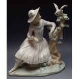 A Nao Spanish porcelain figure, Playing With Doves, Daisa,