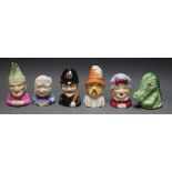 Six Royal Worcester limited edition candle snuffers; Policeman Punch; Judy; Crocodile; Baby Toby,