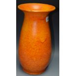 A Dickerware studio pottery vase, wasted body, flared rim, allover mottled orange vermilion glaze,