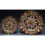 A Royal Crown Derby 1128 pattern shaped circular plate;