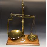 Set of brass weighing scales,