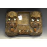 A Maori carved stand,