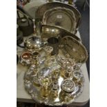 A large qty of silver plated tea ware, trays, vases,