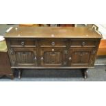 An early 20th century oak sideboard,