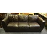 A contemporary three seater dark brown leather sofa