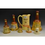 Bells Whisky - a large water jug; a Wade Bells whisky bell;