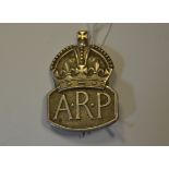 A silver ARP badge, 8.