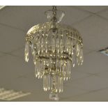 An Edwardian cut glass three-tier chandelier, c.