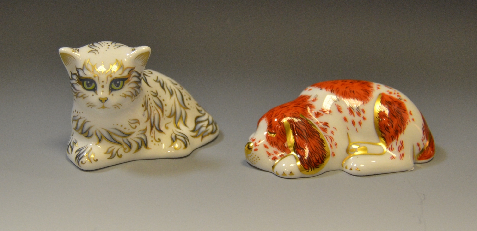 A Royal Crown Derby paperweight Puppy;