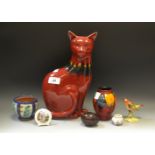 Ceramics - a Poole pottery model seated cat; similar vase; Adderley bird;