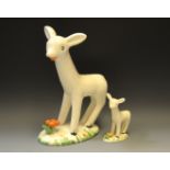 A Midwinter 'Larry The Lamb' on an oval base orange flower registration no.