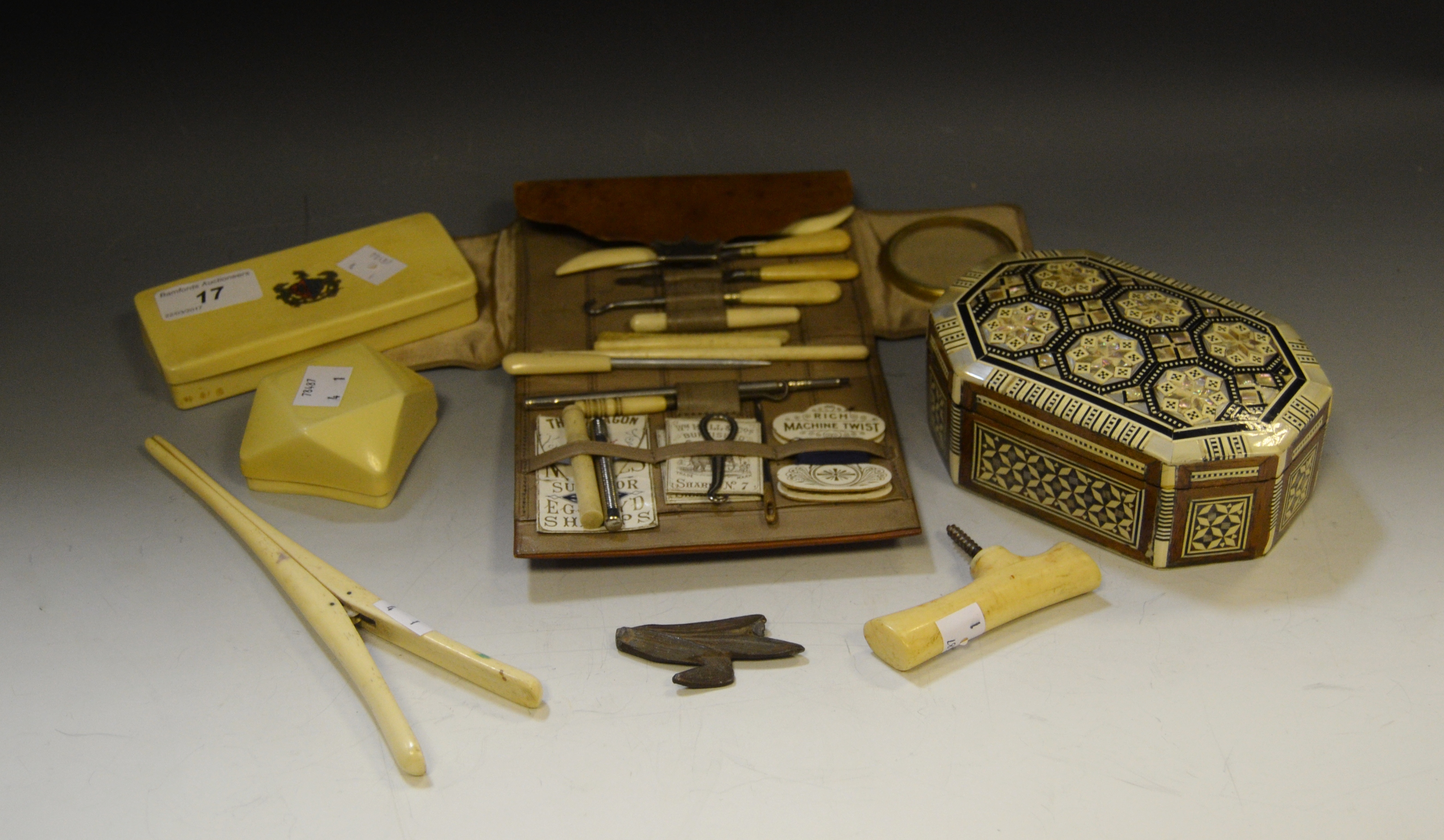 Ephemera - a bone sewing kit,