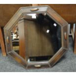 An early 20th century oak octagonal framed mirror, c.