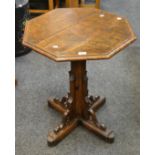 A Gothic oak octagonal side table,