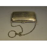 An engine turned silver evening purse, monogrammed DW to cartouche,