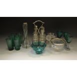An early 20th Century silver plated and cut glass four bottle condiment set;