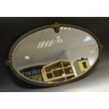 An Art Deco oval bevel edged mirror, 37 cm x 64.
