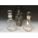 A smoked glass glug-glug decanter; others,