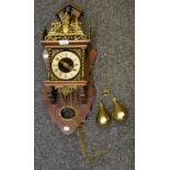 A contemporary burr walnut veneered Dutch wall hanging clock,
