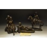 A bronzed figure by David Ginty, 'A Tracker'; another similar, 'Lovers',