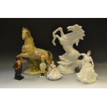 Decorative Ceramics - a Spanish Nao type figure of a rearing Horse; another in the white;