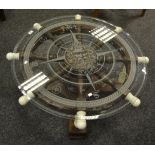 A late 20th Century occasional table in the form of a ship's wheel,