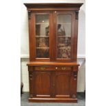 A Victorian mahogany bureau bookcase, scrolling acanthus to frieze,