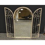 A contemporary arched shaped mirror
