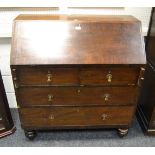 A George III style mahogany bureau, fall front, tooled leather writing surface, enclosing drawers,