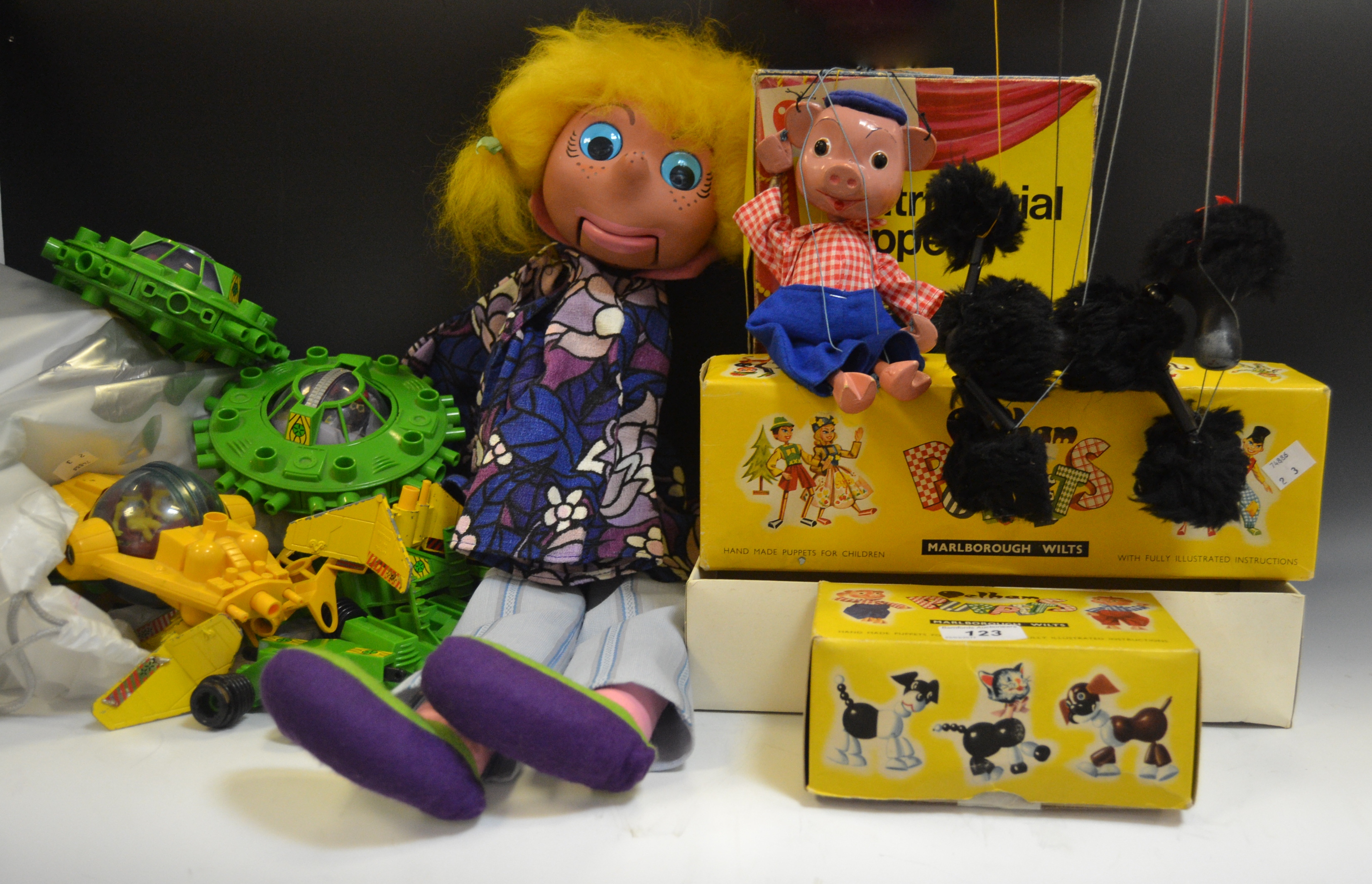 A4 - Poodle, a pelham puppet, boxed; another, SS9 Pinky, boxed; V5 Girl, ventriloquial puppet,