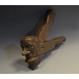 A Black Forest, lever action, carved nutcracker,