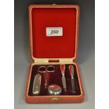 A George V silver manicure set, Birmingham 1925,