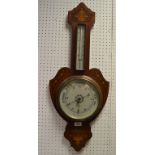 An Edwardian Sheraton Revival mahogany and marquetry barometer,