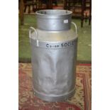 A vintage Co-op Society Ltd. milk churn.