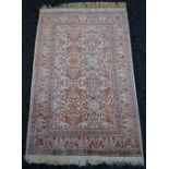 A Kayseri Turkish double knot silk rug, traditional design in hues of amber,