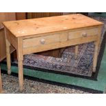 A Victorian pine kitchen table, rectangular top, two short drawers to frieze, turned legs,