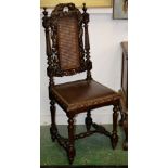 A Jacobean revival oak hall chair