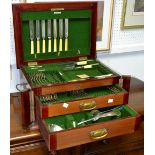 An Edwardian mahogany inlaid plated part canteen of cutlery, Walker & Hall,