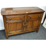 An Ercol style sideboard.