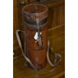 An Edwardian cylindrical leather case stamped W.D.