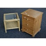 A modern pine three drawer bedside chest;