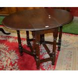 An oak dropleaf gateleg table