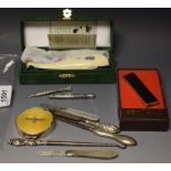 A silver and enamelled circular pill box, RAF wings crest; a folding pocket knife, Sheffield 1897,