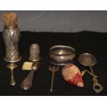 A silver mounted gentleman's shaving brush, embossed with flowers and scrolls,