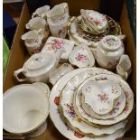 A Royal Crown Derby Posie pattern vase, ginger jar and cover, bridge trays, cream jugs, plates,