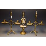 A pair of late 19th Century brass height adjustable two brance table candlesticks, shaped sconces,