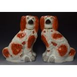 A pair of large Victorian Staffordshire chimney spaniels