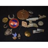 A collection of miscellaneous 20th cventury badges and buttons also a small silver fruitknive,