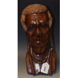 A carved ebony bust of an African male,