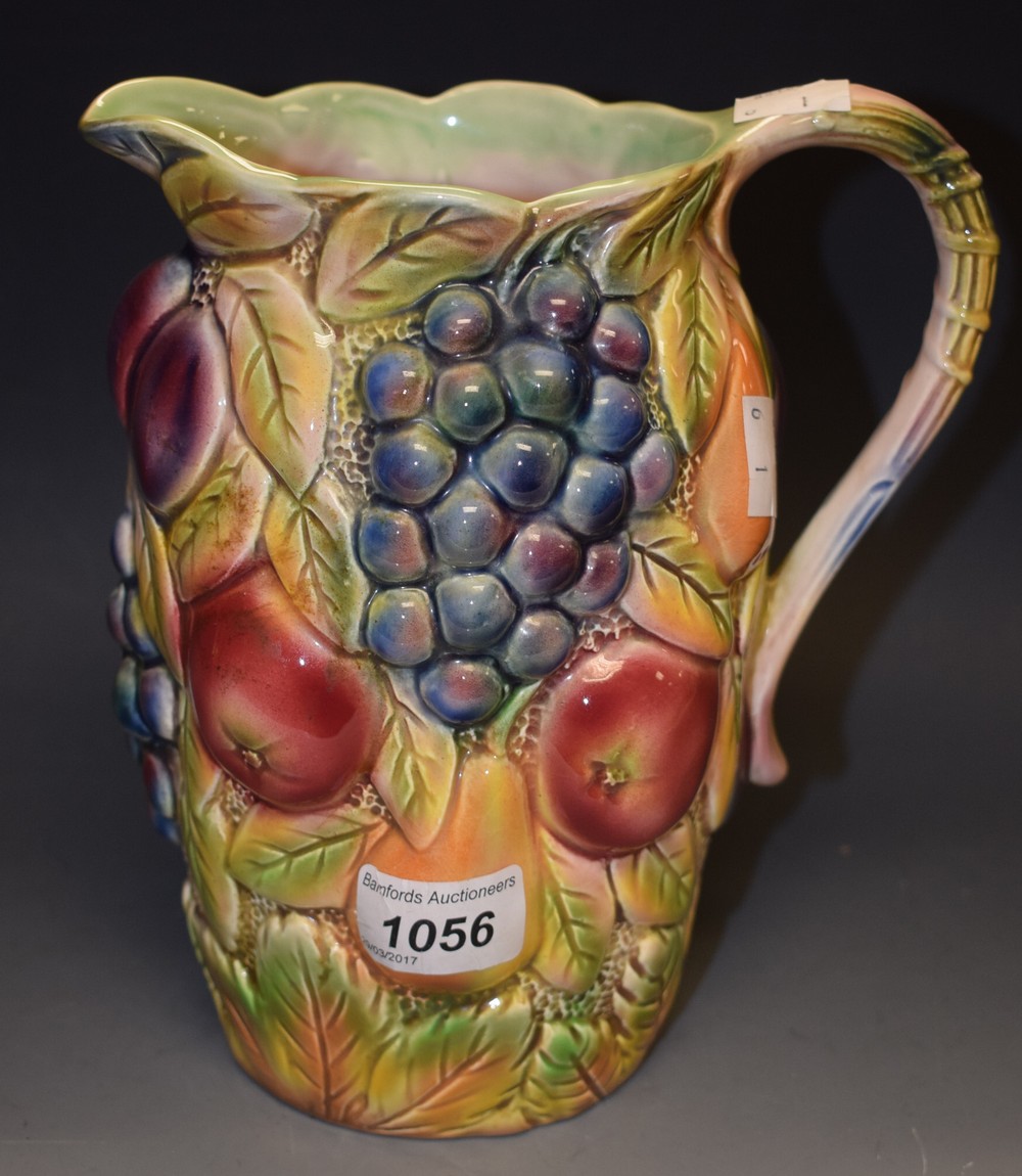 A Falcon Ware jug relief decorated with colourful fruit